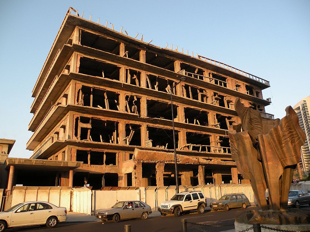 Beirut Corniche 09 St Georges Hotel Site of the 2005 Hariri Bombing with The Torch Sculpture 